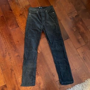 Green corduroy pants.